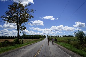 boys-running-away-conutry-road